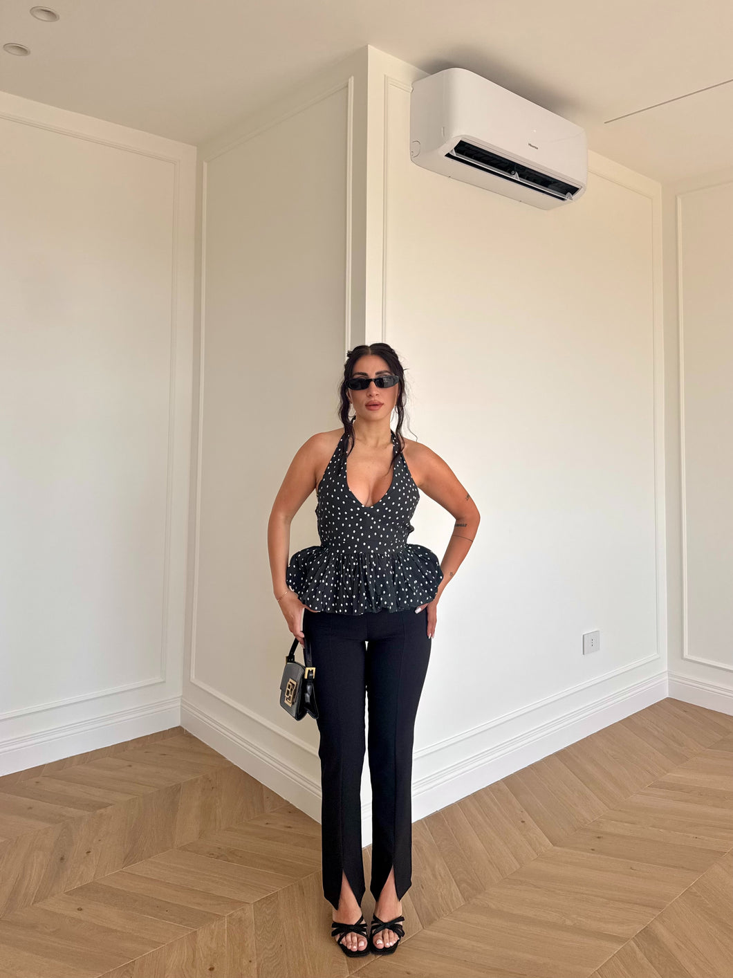 PANTALONI CON SPACCHETTI NERO